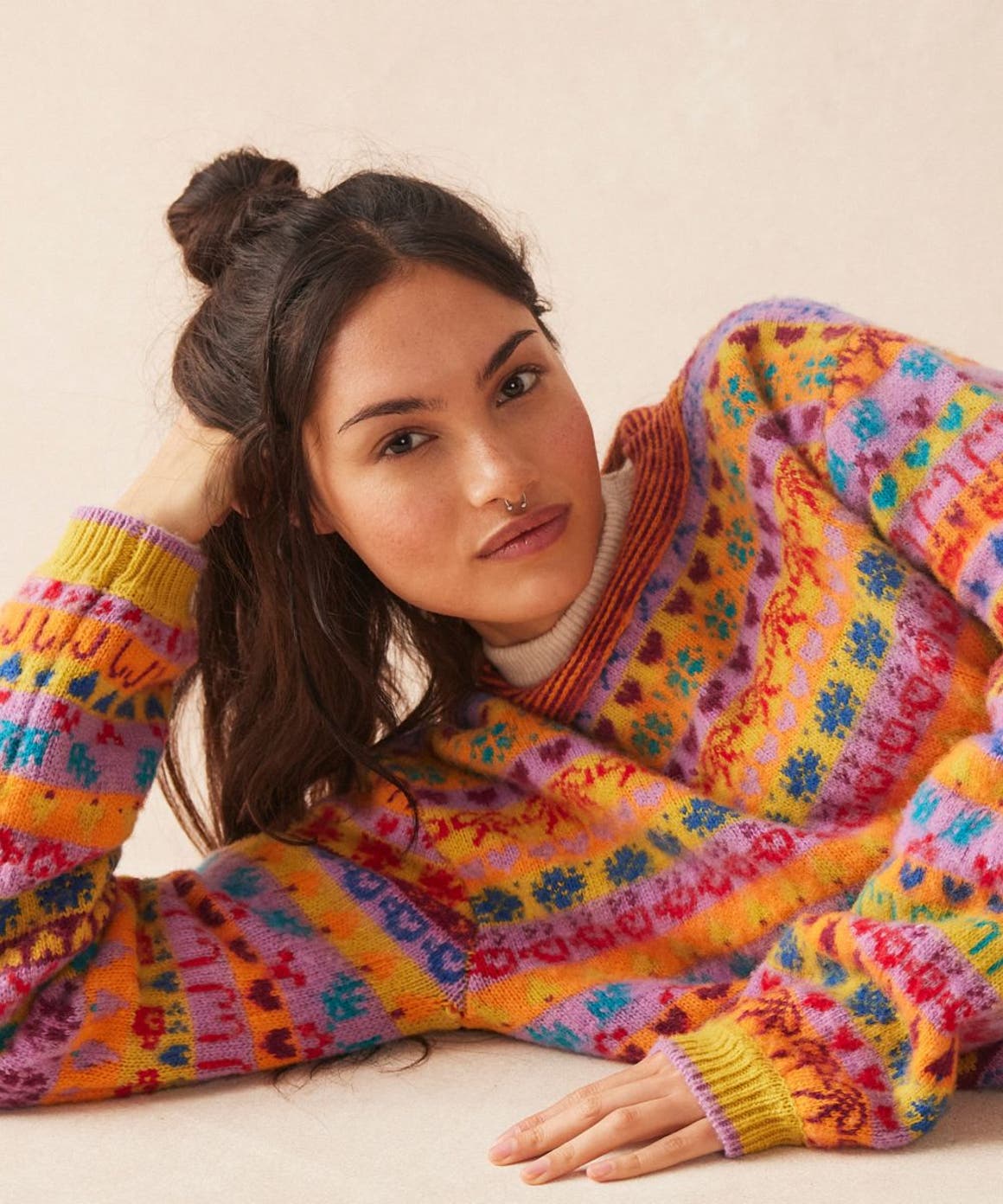 Woman wearing Free People sweater