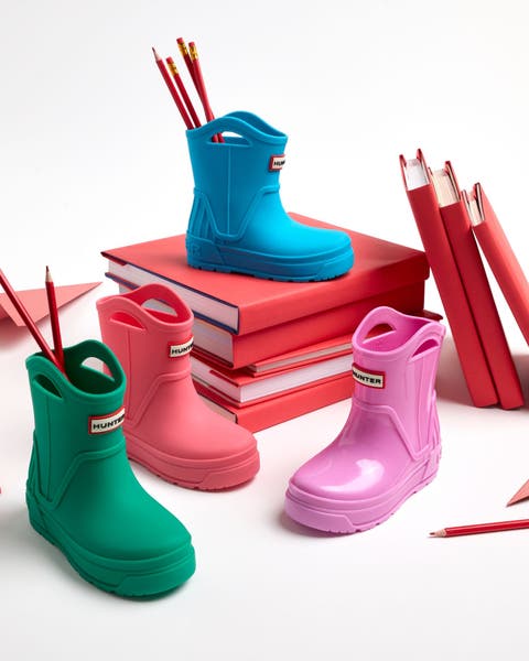 An assortment of colorful Hunter rainboots.