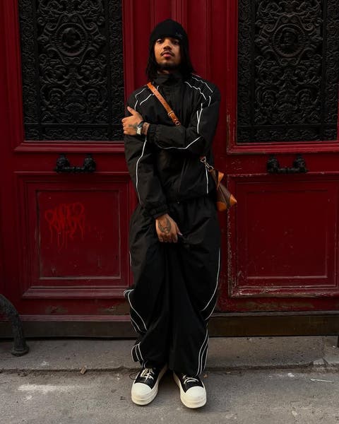 Man wearing black Jaded London tracksuit.