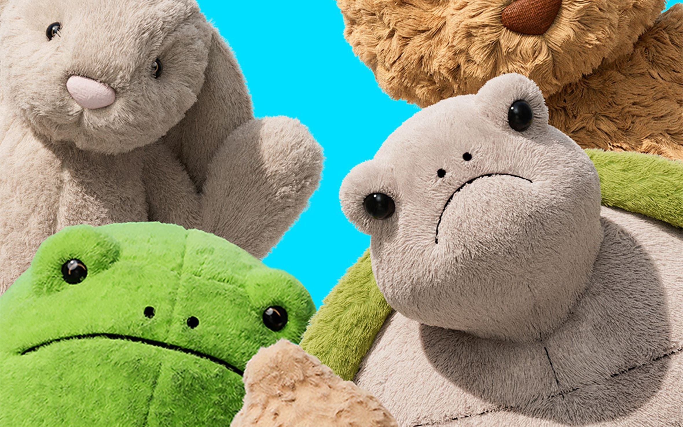 Assorted Jellycats facing the camera; a bunny, bear, peanut, frog and turtle.