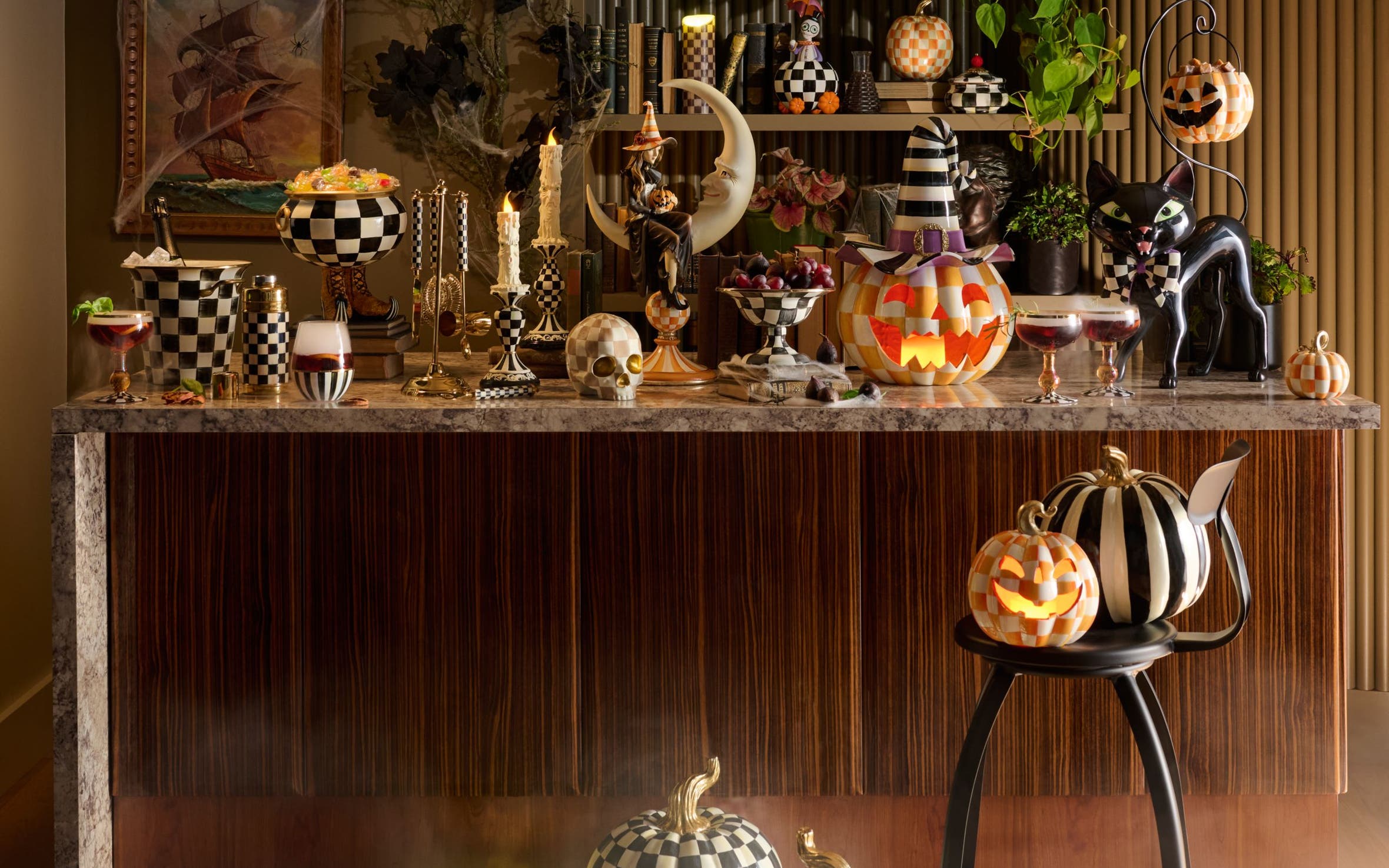 A tablescape of Halloween decorations from Mackenzie-Childs.