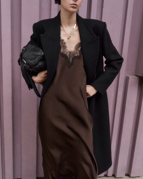 Model wearing a Mango silk dress.