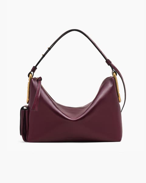 Burgundy leather Marc Jacobs bag.
