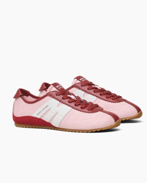 Pink and red Marc Jacobs sneakers.