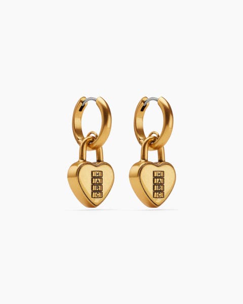 Gold Marc Jacobs earrings.