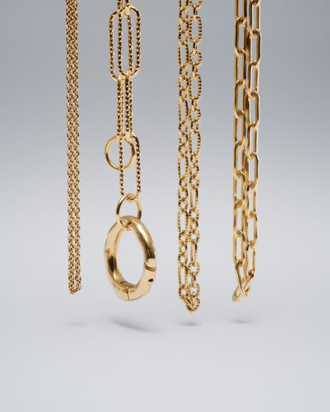 Assorted gold Monica Vinader Necklaces.