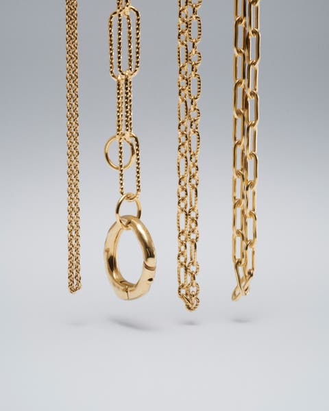 Assorted gold Monica Vinader Necklaces.