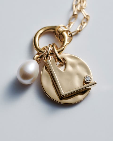 Monica Vinader charm necklace.