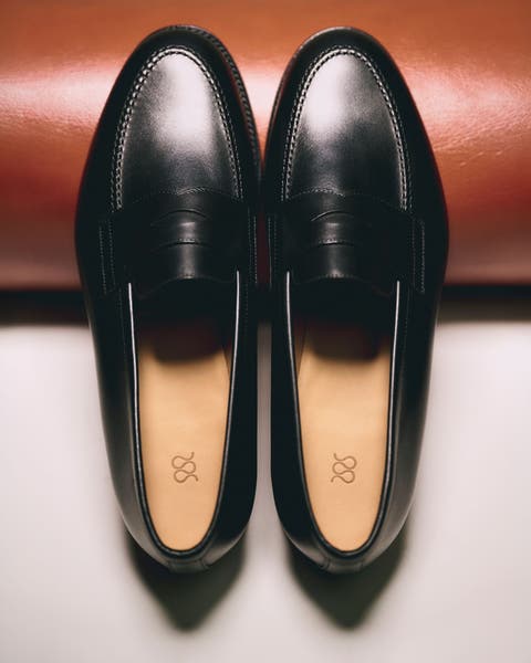 A pair of black loafers.