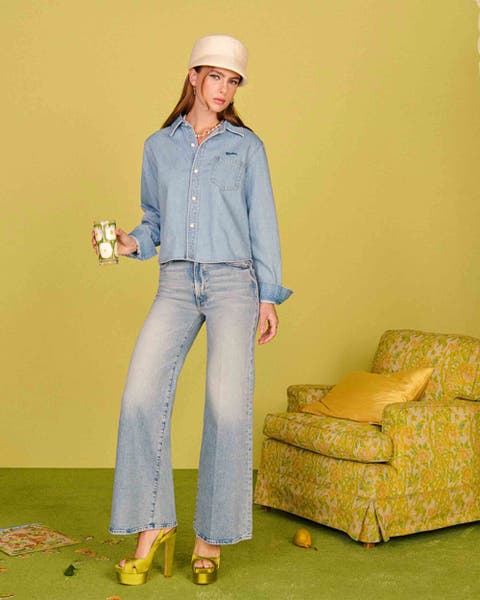 Woman wearing a MOTHER denim set.