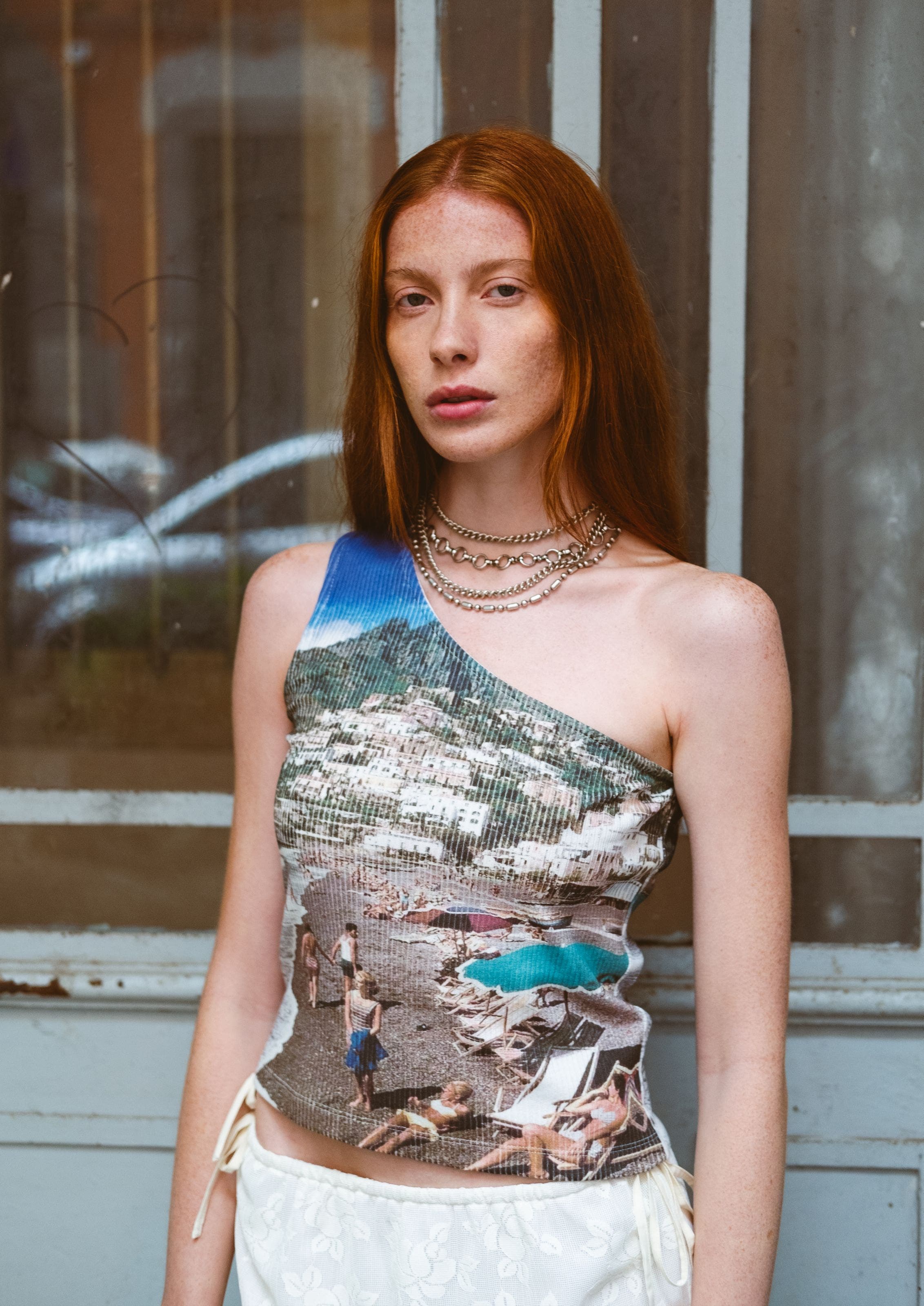 A woman wearing a screen printed tank top.