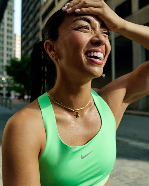 Woman wearing a Nike sports bra.