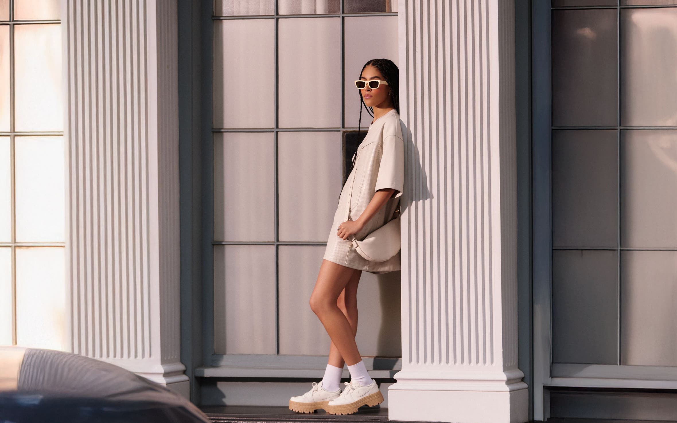 A woman wearing Jordan clothing, shoes and accessories.