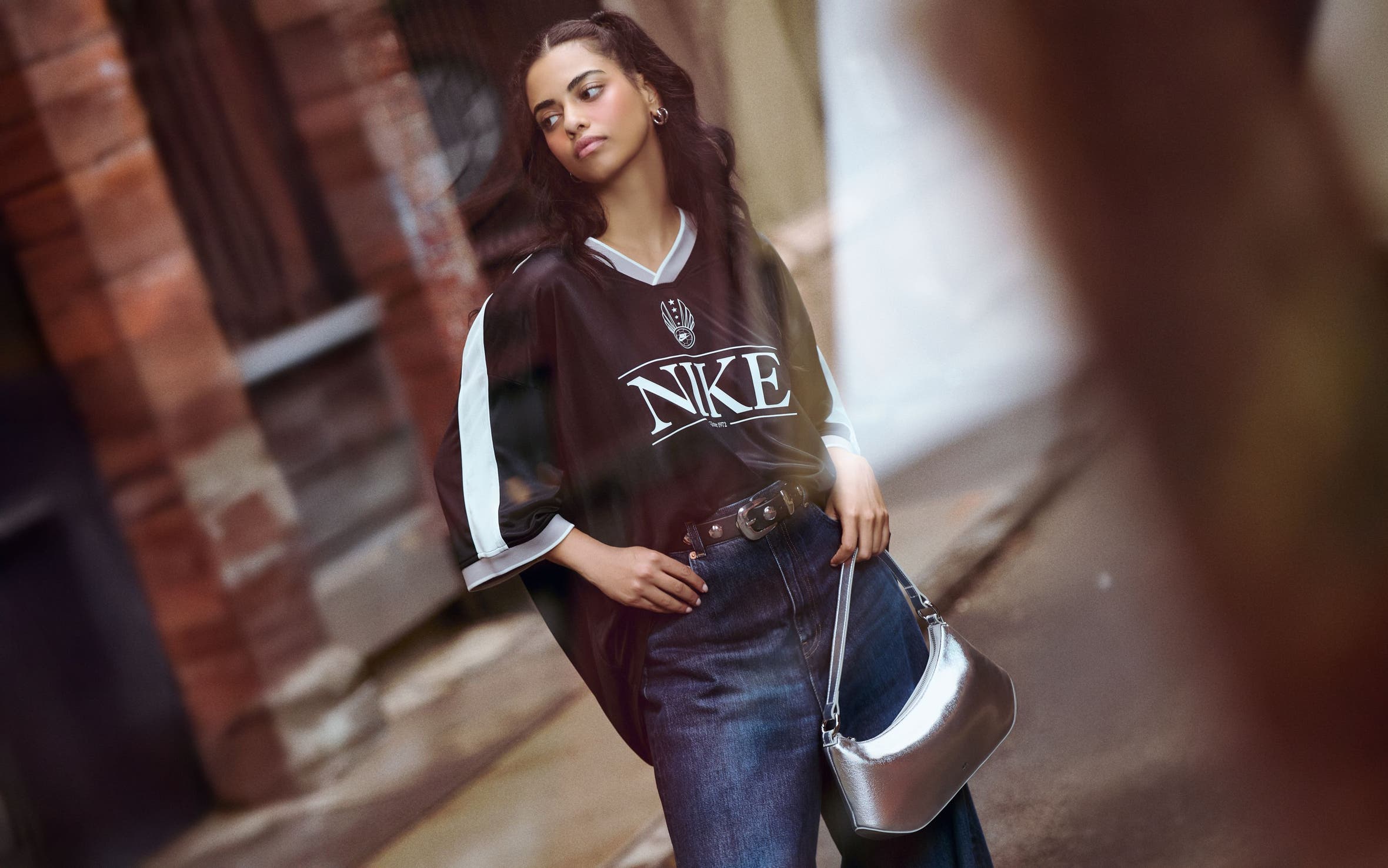 A woman wearing Nike clothing and accessories.