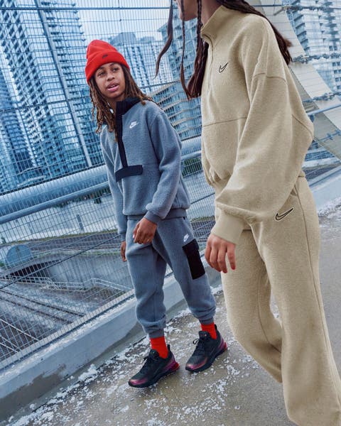 Model wearing a Nike outfit and shoes