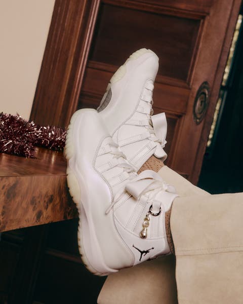 woman wearing jordan shoes.