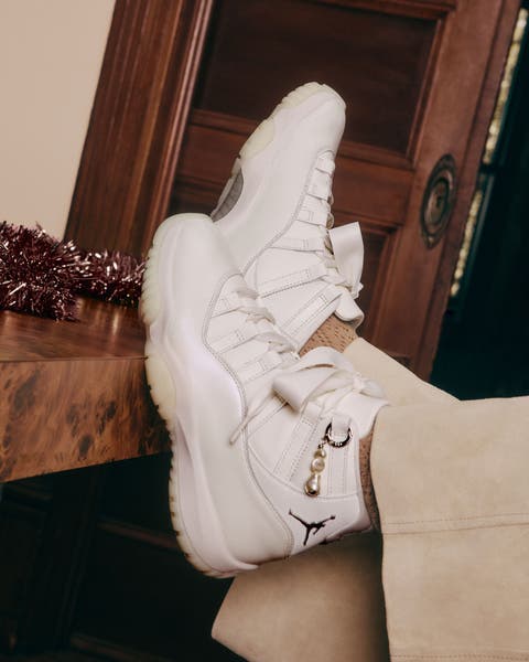 Model wearing Jordan sneakers.