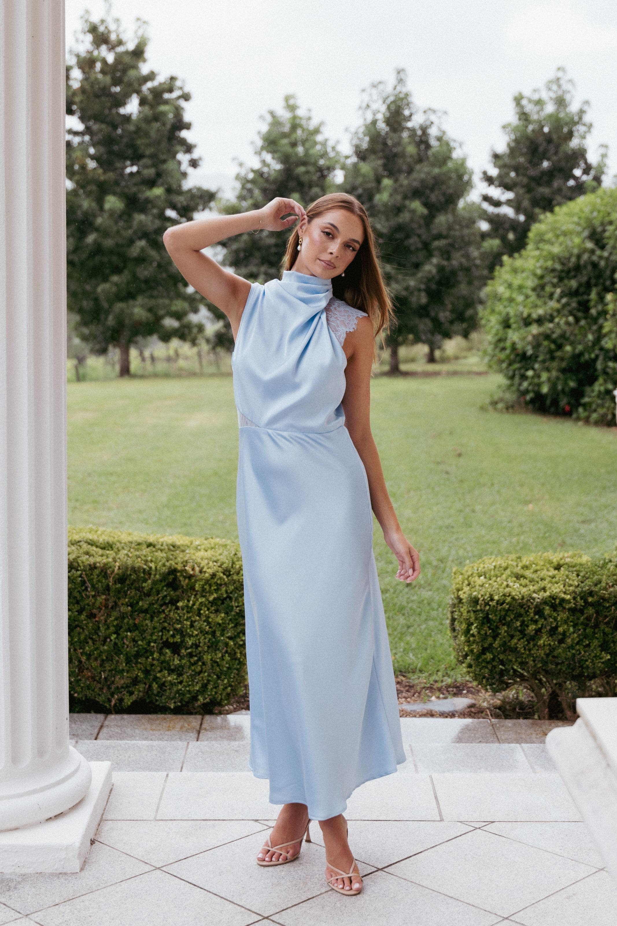 Women wearing light blue ankle length dress.