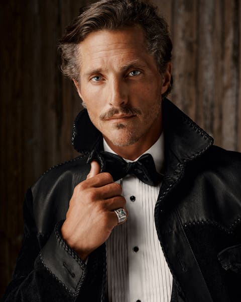 Model wearing a Ralph Lauren Purple Label suit