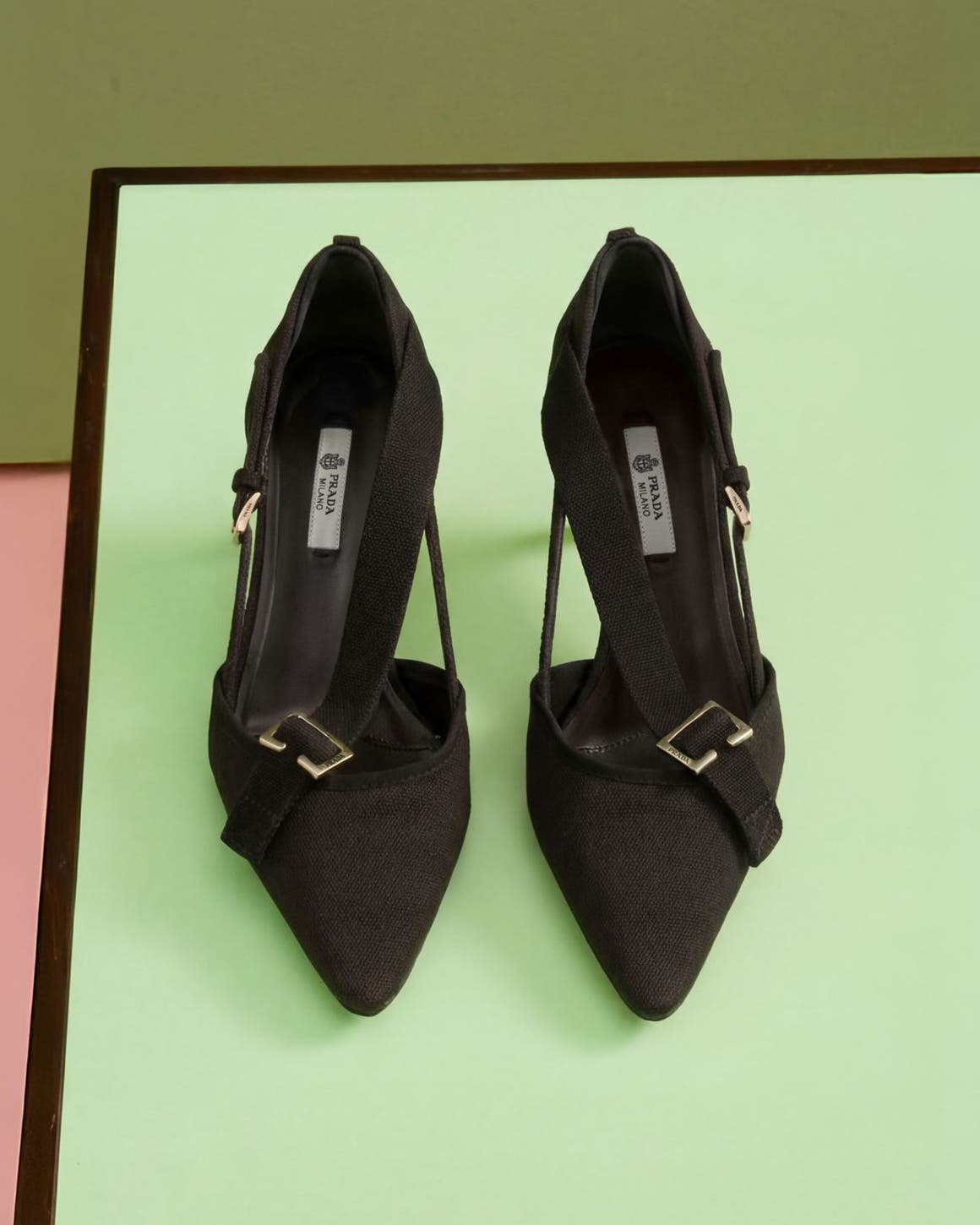 Prada heels in black.