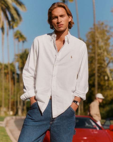 Man wearing Polo Ralph Lauren oxford shirt.