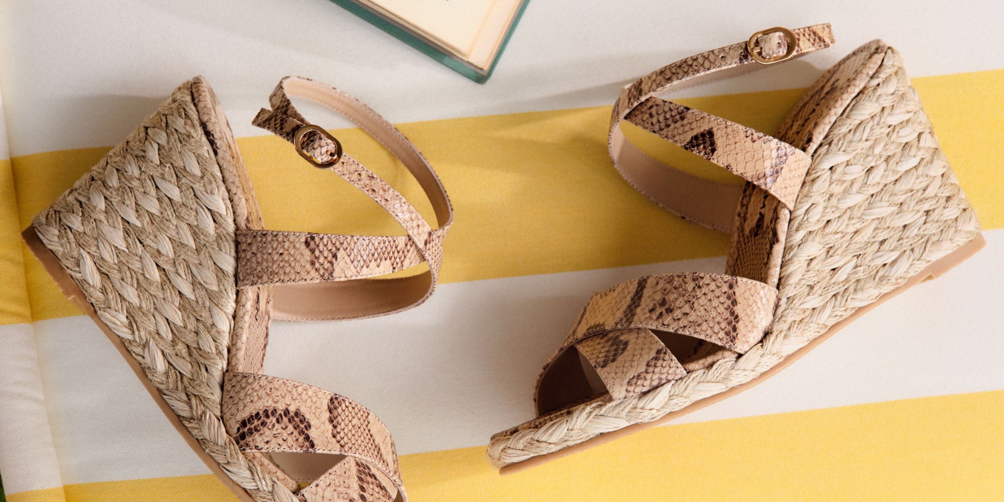 Stuart Weitzman snake print wedges.