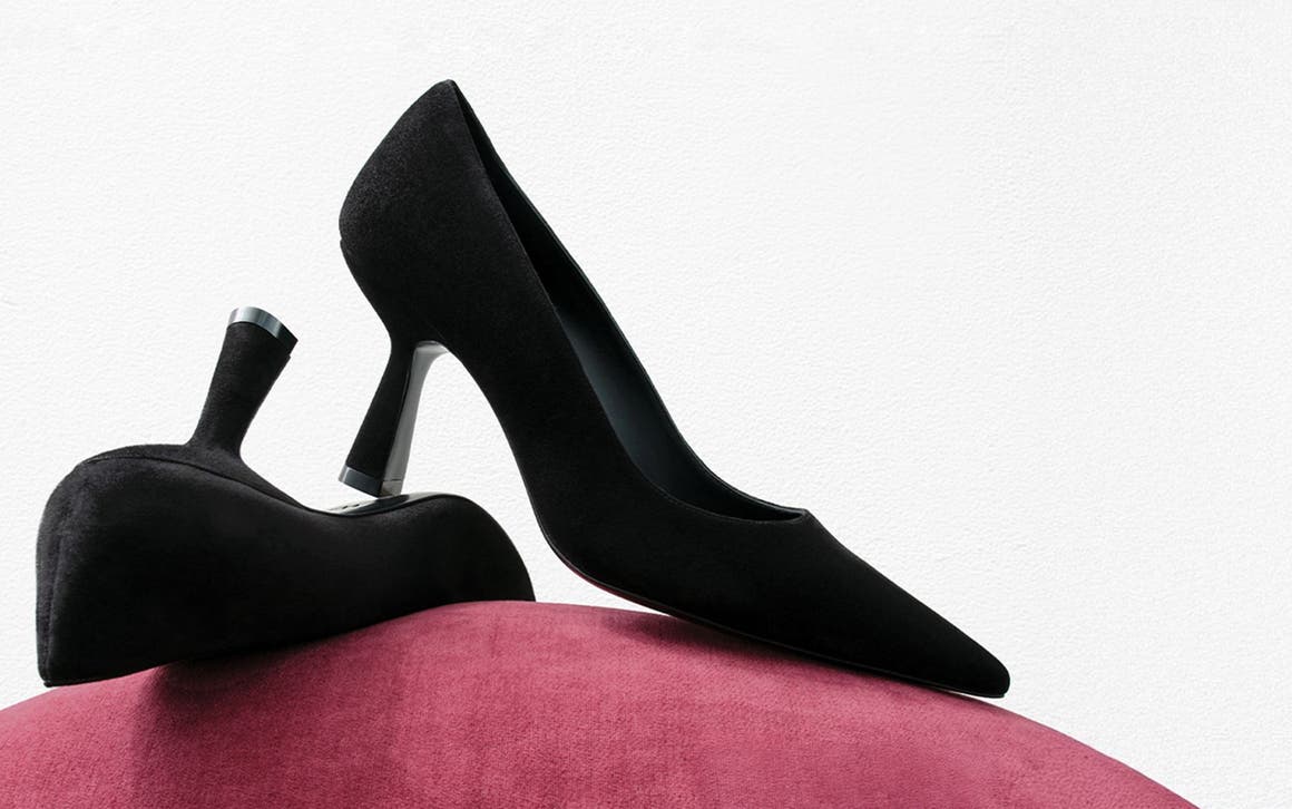Black suede Stuart Weitzman pumps. 