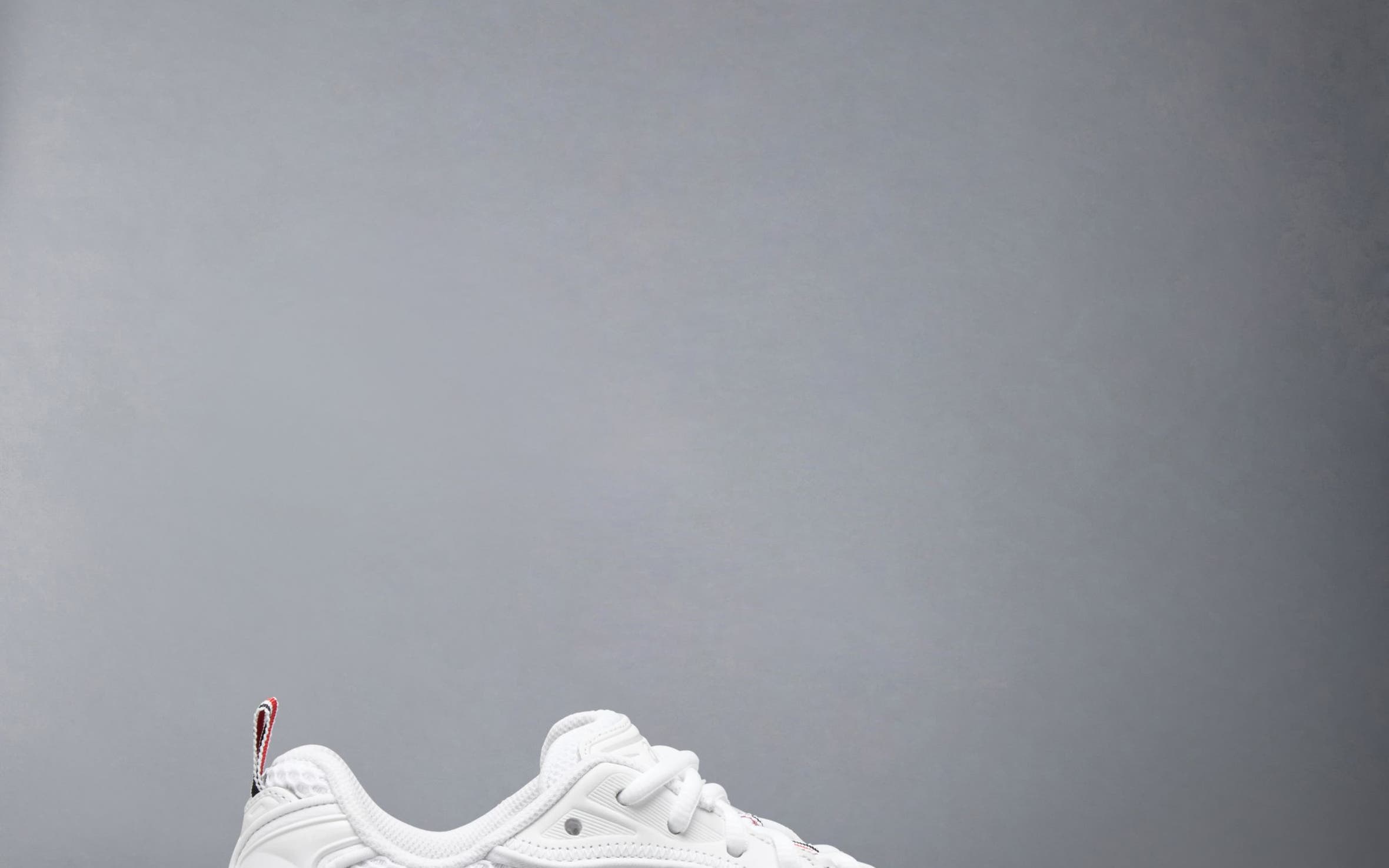 Thom Browne x ASICS sneaker in white.