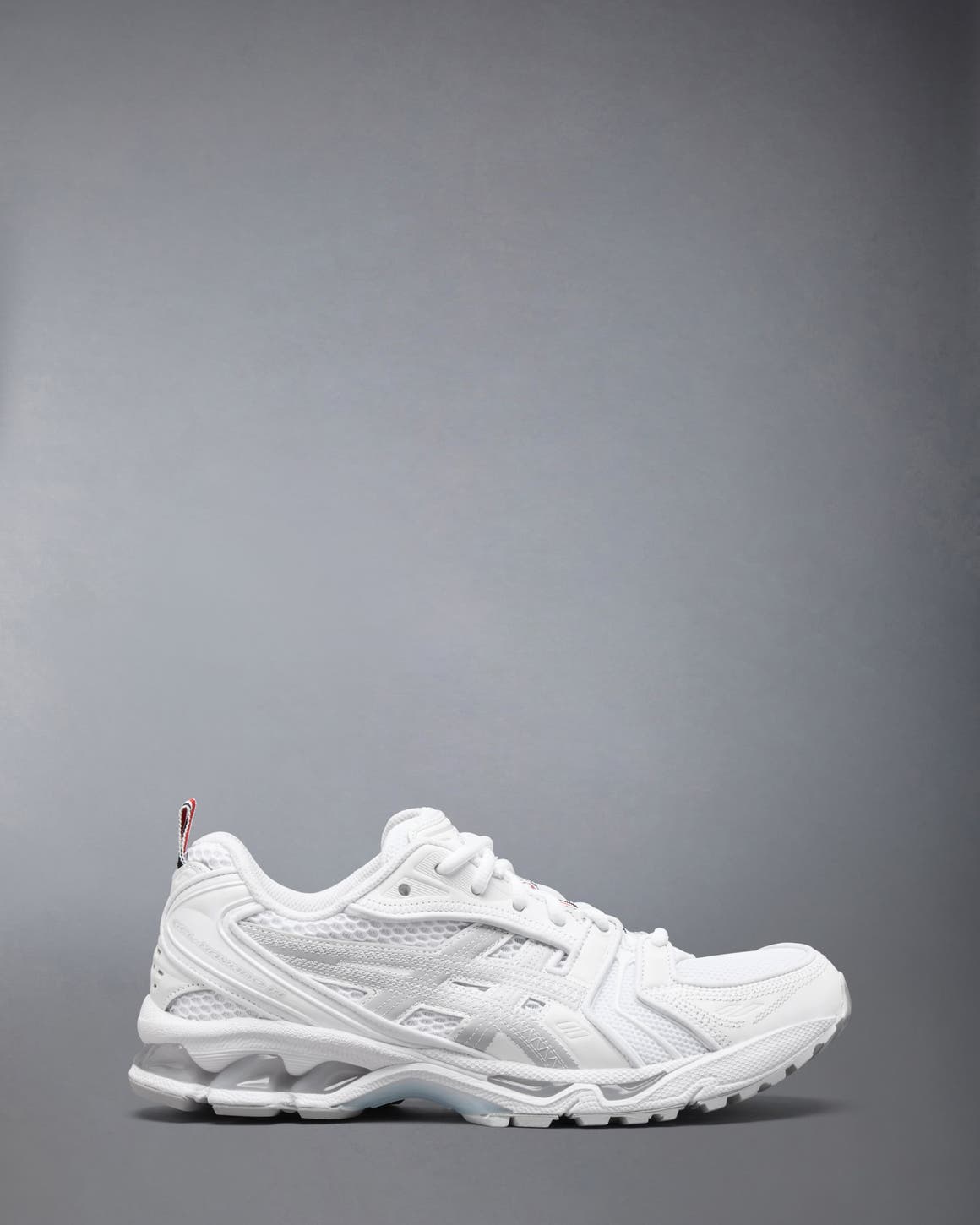 Thom Browne x ASICS sneaker in white.