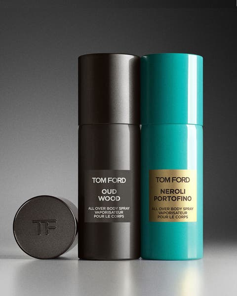 A pair of Tom Ford's body sprays for men.