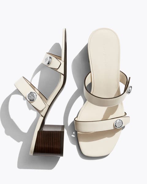 White Tory Burch heels.
