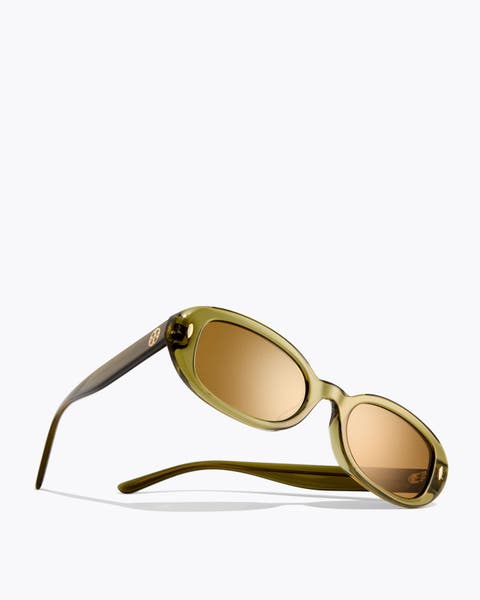 Green Tory Burch sunglasses.