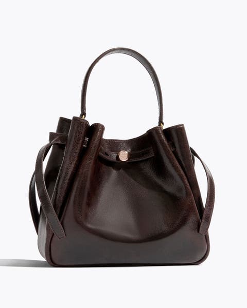 Brown Tory Burch bag.