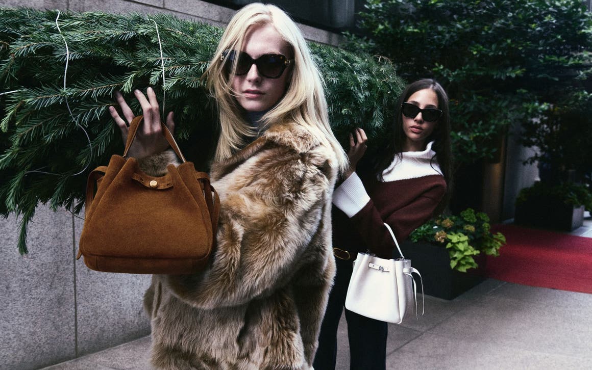 Two models wearing Tory Burch looks.