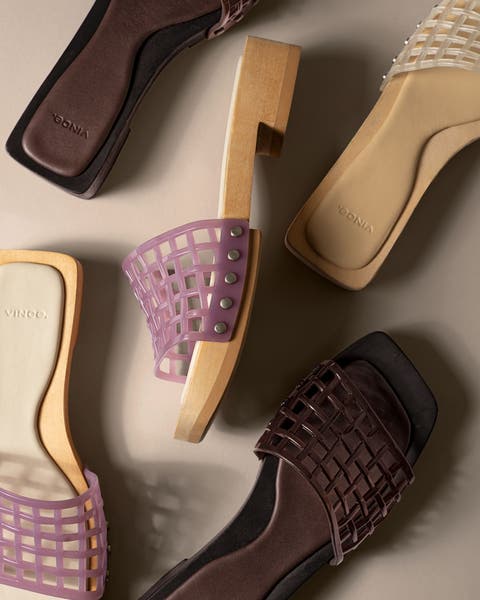 Various pairs of jelly sandals.