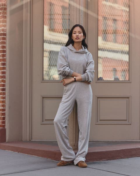 Woman wearing grey Vuori sweat set.
