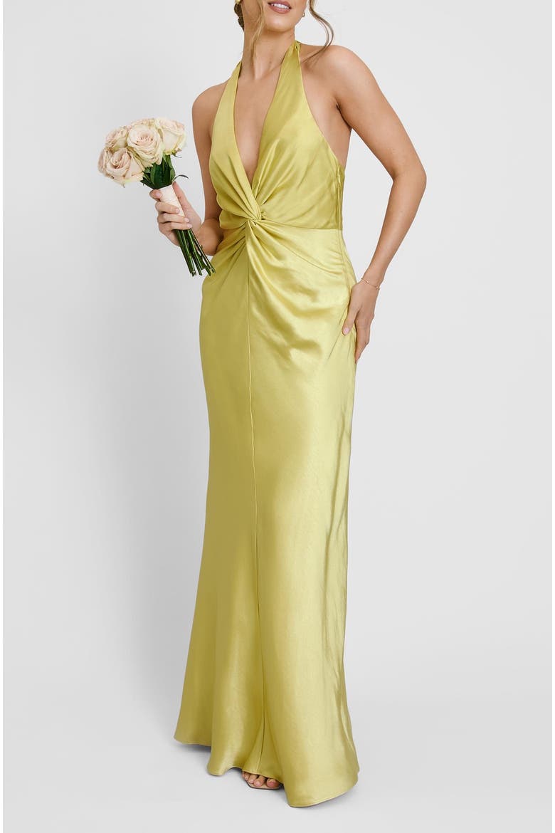 chartreuse bridesmaid dress Save this post for your coastal fall wedding inspo Chartreuse bridesmaid dresses paired with shades of blue, a ceremony space wrapped in lush greenery and hydrangeas, and the most gorgeous reception