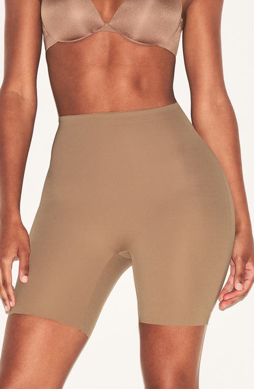 Skims Hip Enhancing Mid Thigh Padded Shorts In Brown