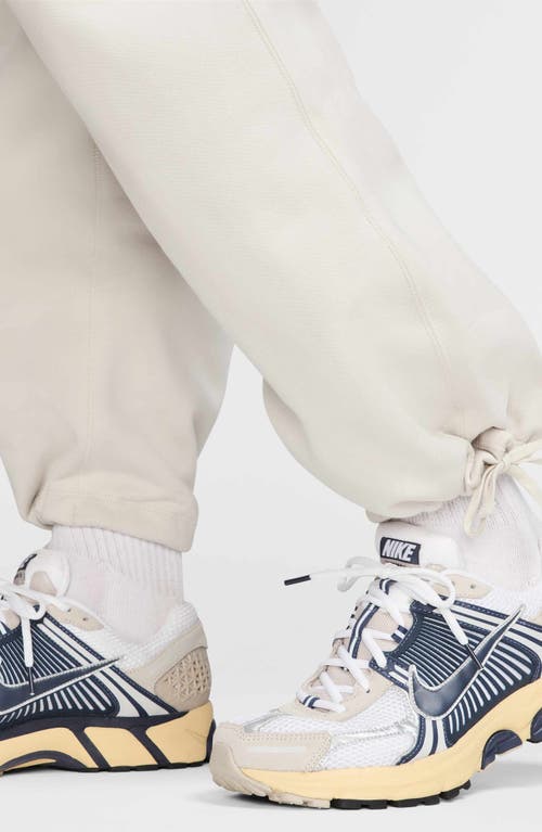Nike Men's Solo Swoosh Open-hem Fleece Pants In Light Bone/white