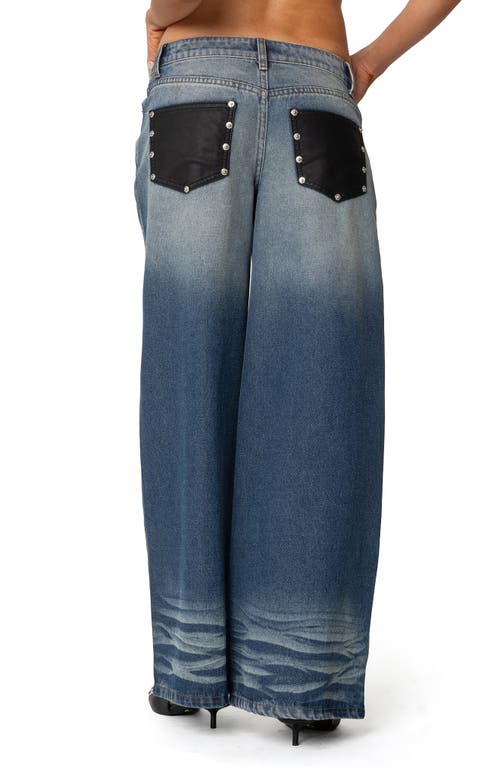 Shop Edikted Faux Leather Pocket Low Rise Wide Leg Jeans In Blue