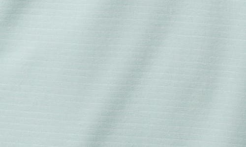 Travismathew The Heater Solid Short Sleeve Performance Polo In Eggshell Blue