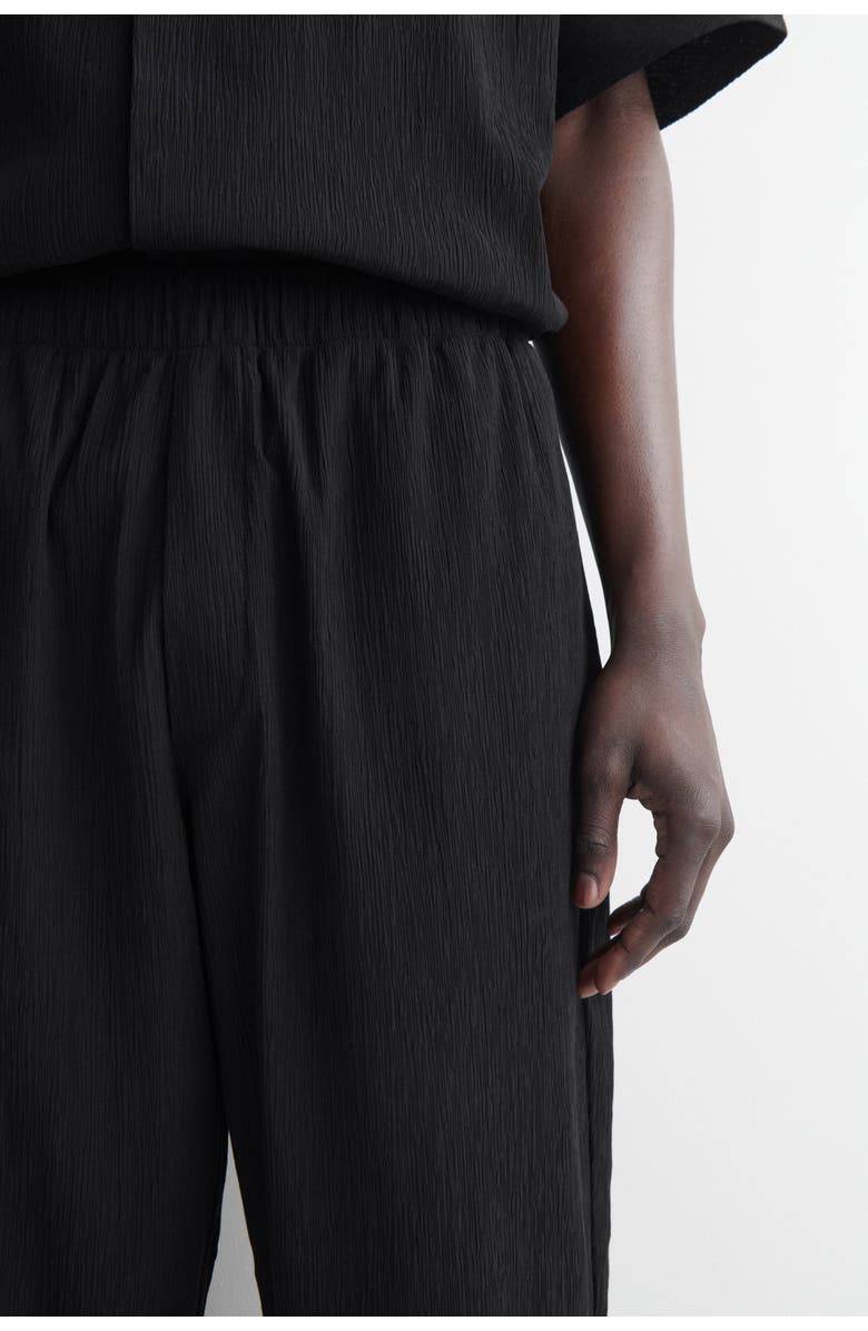 COS Crinkled-cotton Relaxed-fit Tapered Trousers, Alternate, color, Black