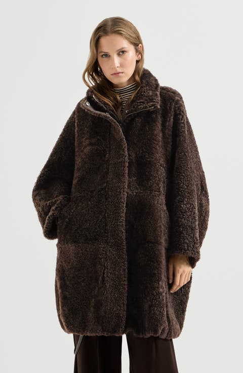 Fuzzy shearling coat with shiny zipper pull