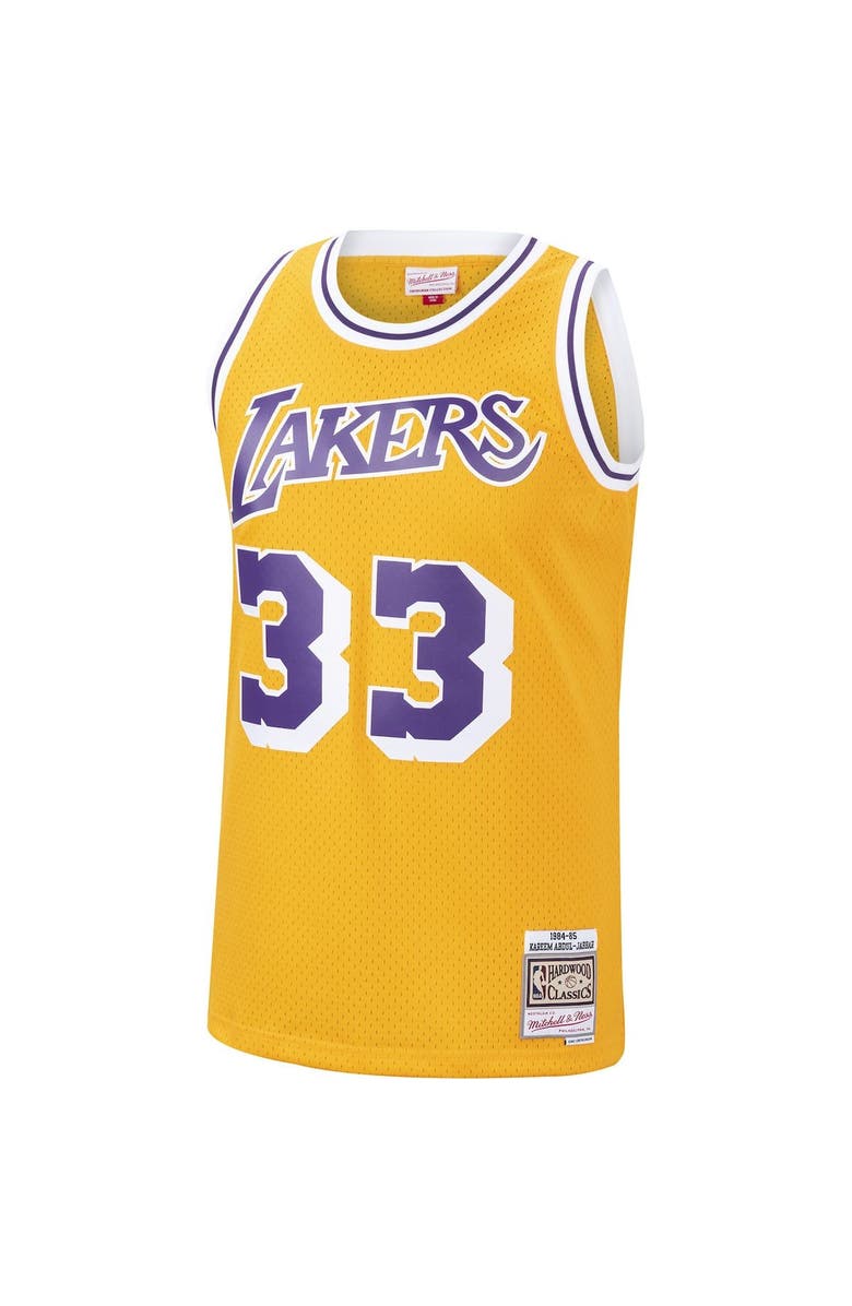 Mitchell & Ness Men's Mitchell & Ness Kareem Abdul-Jabbar Gold Los Angeles Lakers 1984-85 Hardwood Classics Swingman Jersey, Alternate, color, 