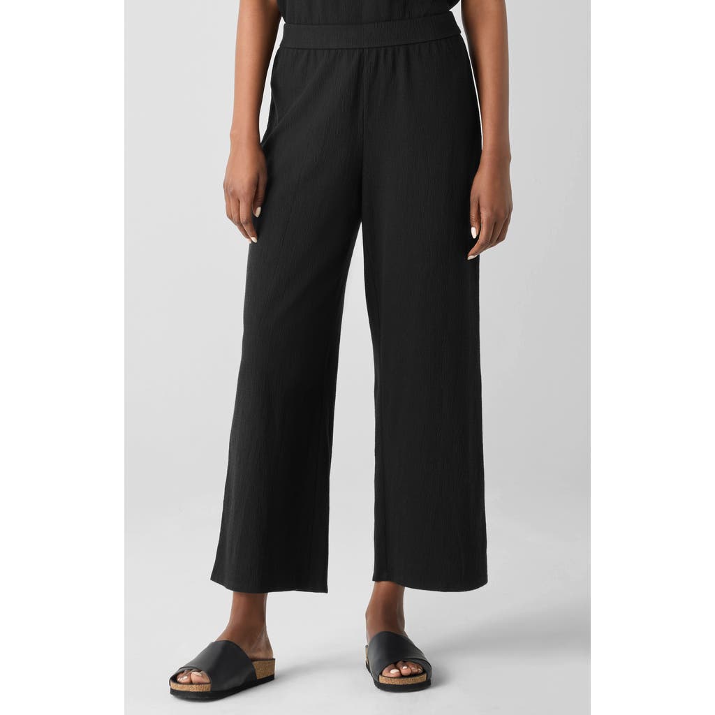 Shop Eileen Fisher Jersey Ankle Wide Leg Pants In Black
