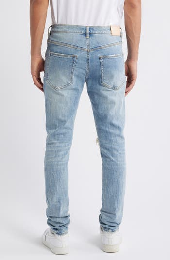 Ripped Knee Blowout Slim Jeans
