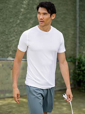 Man wearing T-shirt and shorts.