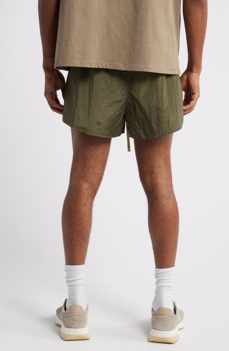 Fear of God Essentials Gender Inclusive Nylon Ripstop Running Shorts, Alternate, color, 