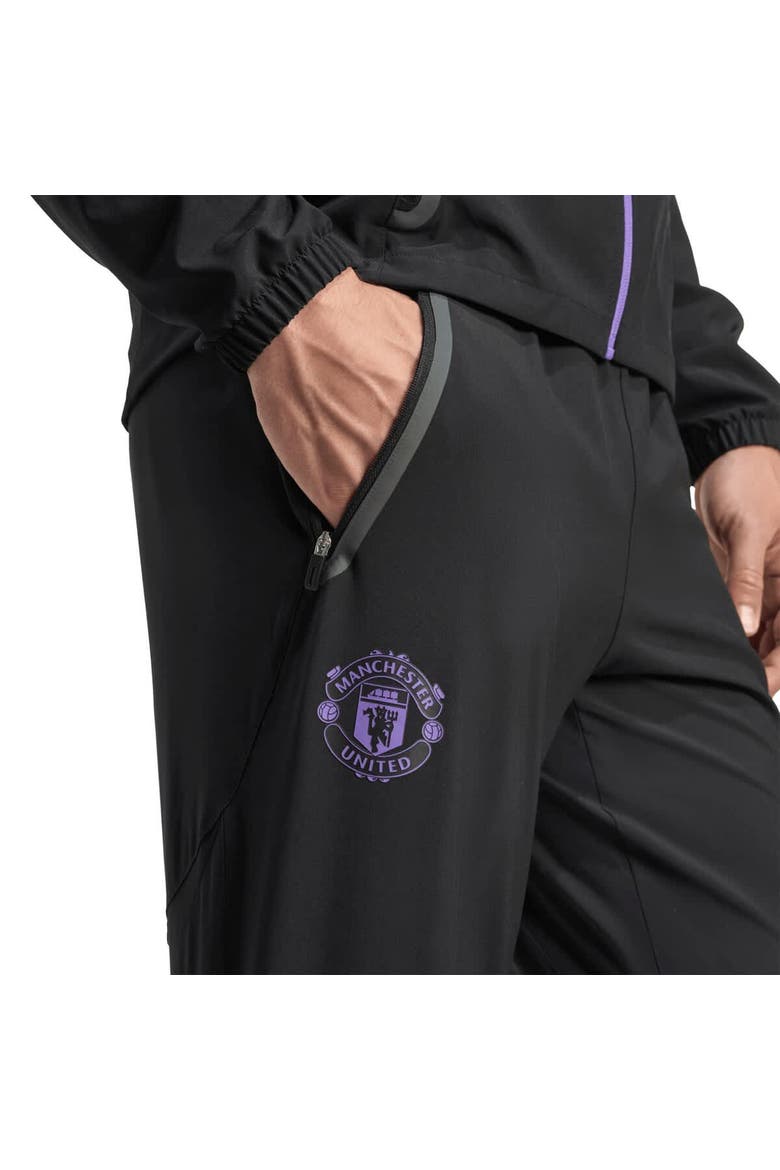 Men's adidas Black Manchester United 2025/26 Tiro Vis Tech Travel Pants, Alternate, color, Black