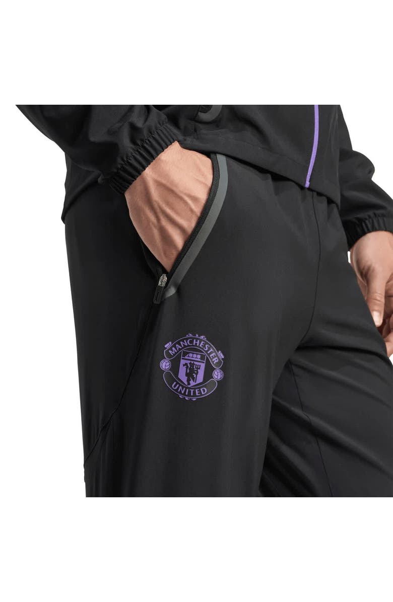 adidas Men's adidas Black Manchester United 2025/26 Tiro Vis Tech Travel Pants, Alternate, color, Black